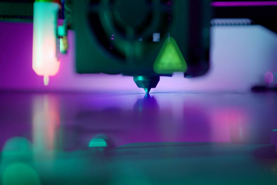 Maker reviewing digital 3D model on screen